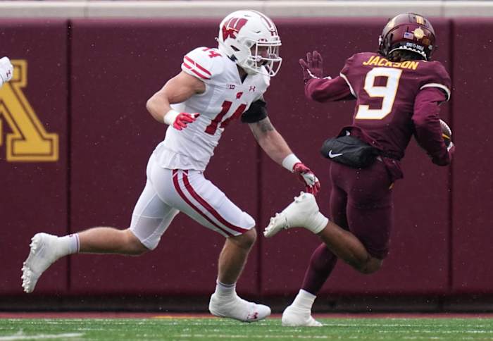 Nov 25, 2023; Minneapolis, Minnesota, USA; Minnesota Golden Gophers wide receiver Daniel Jackson (9) out runs Wisconsin Badgers safety Preston Zachman (14) to score a touchdown during the first quarter at Huntington Bank Stadium.